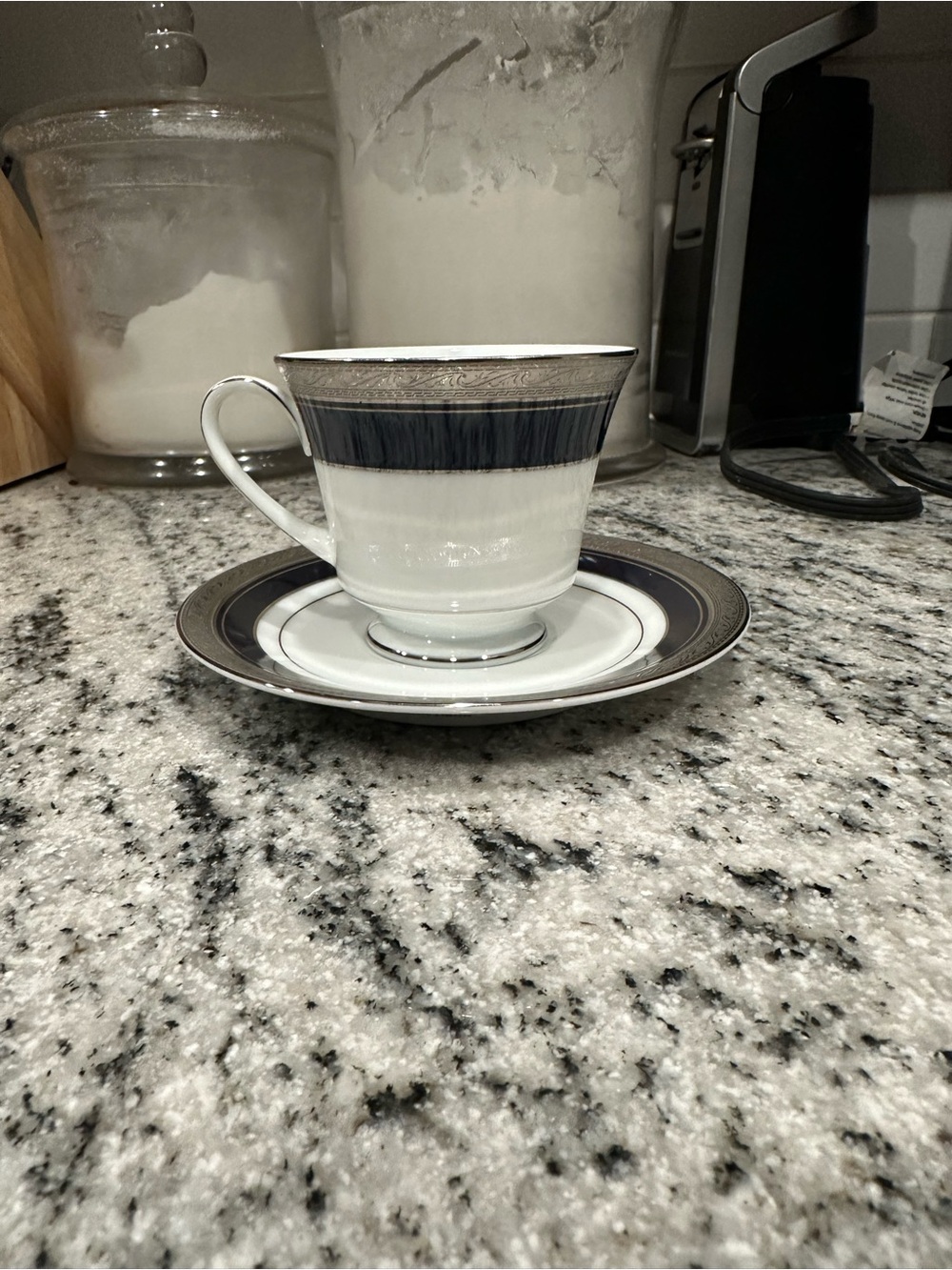 Noritake White and Navy Porcelain Teacup with Saucer